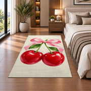 Cherry Bow Rug in a bedroom beside the bed