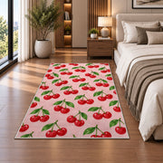 Cherry Pattern Rug in a bedroom beside the bed