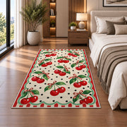 Retro Cherry Polka Dot Rug in a bedroom beside the bed