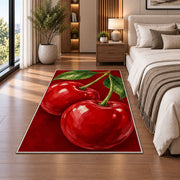 Giant Cherry Rug in a bedroom beside the bed