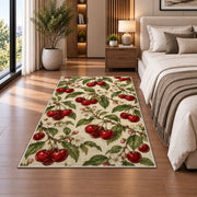 Vintage Botanical Cherry Rug in a bedroom beside the bed