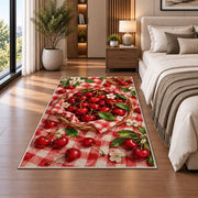 Cherry Picnic Rug in a bedroom beside the bed