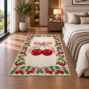 Cherry Border Rug in a bedroom beside the bed