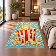 Popcorn Box Rug in a bedroom beside the bed