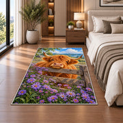 Highland Cow Fence Rug in a bedroom beside the bed