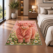 Pink Highland Cow Rug in a bedroom beside the bed