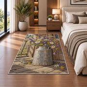 Milk Can with Wildflowers rug in a bedroom beside the bed