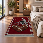Football Helmet rug in a bedroom beside the bed