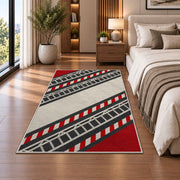 Fire Ladder Stripe rug in a bedroom beside the bed