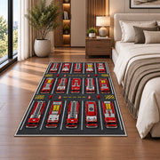 Fire Truck Parking Lot rug in a bedroom beside the bed
