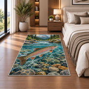 Rainbow trout stream rug in a bedroom beside the bed