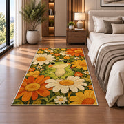 retro frog with daisies rug in a bedroom beside the bed