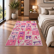 Pink Checkered Gymnastics Rug in a bedroom beside the bed