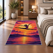 Gymnast Sunset Leap Rug in a bedroom beside the bed