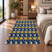 Gold Coin and Dreidel Rug in a bedroom beside the bed