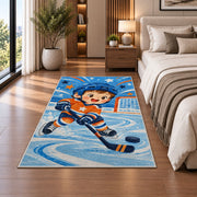 Little Hockey Star rug in a bedroom beside the bed