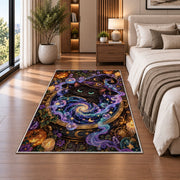 Black cat witch cauldron galaxy area rug in a bedroom beside the bed