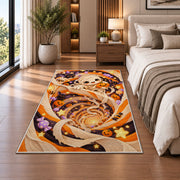 Cute mummy orange swirl area rug in a bedroom beside the bed