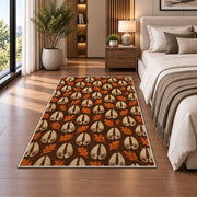 Deer Tracks Pattern rug in a bedroom beside the bed
