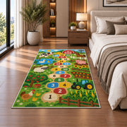 Green farm animal hopscotch rug with numbered circles, barn, tractor and fields, shown from an angled room perspective