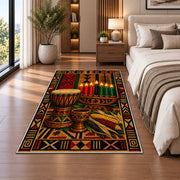 Djembe Drum Kwanzaa Rug in a bedroom beside the bed