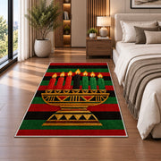 Kwanzaa Stripe Rug in a bedroom beside the bed