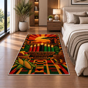 African Sunset Kwanzaa Rug in a bedroom beside the bed