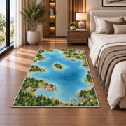 Illustrated lake map rug in a bedroom beside the bed