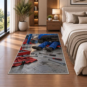 Mechanic working under a car rug in a bedroom beside the bed