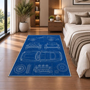 Classic car blueprint rug in a bedroom beside the bed