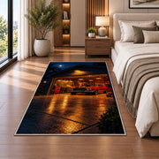 Garage at night with a muscle car rug in a bedroom beside the bed