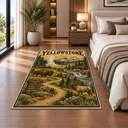 Yellowstone travel poster with bison and elk rug in a bedroom beside the bed