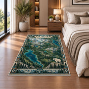 Illustrated Glacier National Park map rug in a bedroom beside the bed