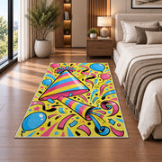 Party hat and noisemaker rug in a bedroom beside the bed