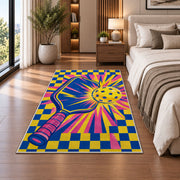 Pop Art Pickleball Rug in a bedroom beside the bed