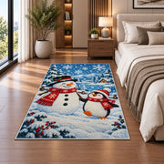 Snowman and Penguin Rug in a bedroom beside the bed