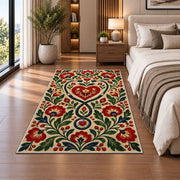 Folk Art Nurse Rug in a bedroom beside the bed