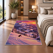 Sunset ski slope rug in a bedroom beside the bed