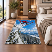 Ski jumper rug in a bedroom beside the bed