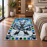 Trail difficulty symbols rug in a bedroom beside the bed