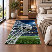 soccer ball hitting the net rug in a bedroom beside the bed
