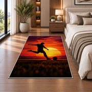 soccer player silhouette at sunset rug in a bedroom beside the bed