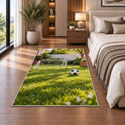 backyard soccer goal rug in a bedroom beside the bed