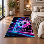 neon soccer ball and goal rug in a bedroom beside the bed