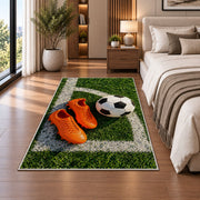 orange soccer cleats and ball rug in a bedroom beside the bed