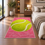 Giant Tennis Ball Rug in a bedroom beside the bed