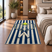 Preppy Stripe Tennis Rug in a bedroom beside the bed