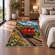 Red Caboose Rug in a bedroom beside the bed