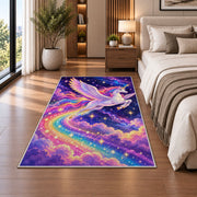 winged unicorn flying through stars rug in a bedroom beside the bed