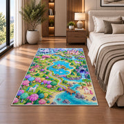 unicorn land map rug in a bedroom beside the bed